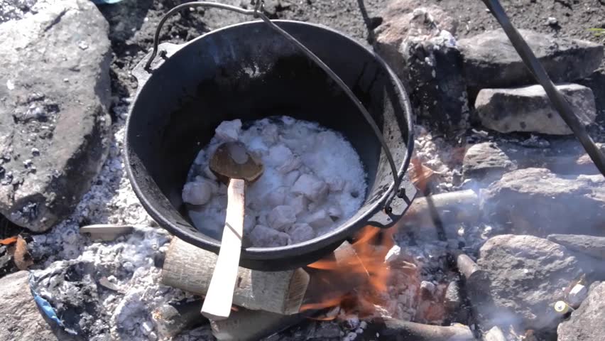 tradition pot on wood fire